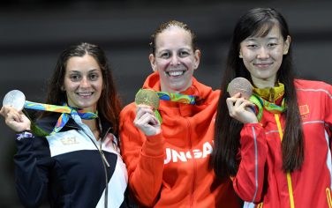 (L-R) Silver medalist Italy's Rossella Fiamingo, gold medalist Hungary's Emese Szasz and bronze medalist China's Sun Yiwen pose with their medals on the podium after the womens individual epee fencing event of the Rio 2016 Olympic Games, on August 6, 2016, at the Carioca Arena 3, in Rio de Janeiro. / AFP / Kirill KUDRYAVTSEV        (Photo credit should read KIRILL KUDRYAVTSEV/AFP/Getty Images)