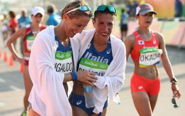 RIO DE JANEIRO, BRAZIL - AUGUST 19:  Elisa Rigaudo of Italy and Antonella Palmisano of Italy  embrace after the Women's 20km Walk final on Day 14 of the Rio 2016 Olympic Games at Pontal on August 19, 2016 in Rio de Janeiro, Brazil.  (Photo by Julian Finney/Getty Images)
