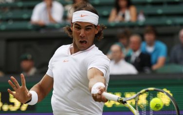 Rafael Nadal of Spain returns to Robin Haase of the Netherlands, during their men's singles match at the All England Lawn Tennis Championships at Wimbledon, Thursday, June 24, 2010. (AP Photo/Anja Niedringhaus)