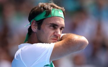MELBOURNE, AUSTRALIA - JANUARY 26:  Roger Federer of Switzerland looks on in his quarter final match against Tomas Berdych of the Czech Republic during day nine of the 2016 Australian Open at Melbourne Park on January 26, 2016 in Melbourne, Australia.  (Photo by Michael Dodge/Getty Images)