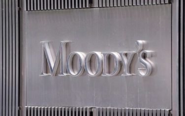 epa03105018 (FILE) A file picture dated 13 July 2011 shows the Moody's logo outside the offices of Moody's Corporation in New York, New York, USA. According to media reports on 14 February 2012, Moody's Investors Service cut the debt ratings of six European countries including Italy, Spain and Portugal and changed its outlook on Britain and France's top AAA ratings to 'negative.'  EPA/ANDREW GOMBERT
