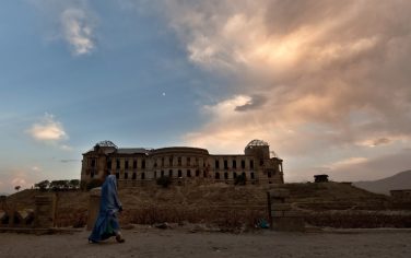An Afghan walks past the ruins of Darulaman palace, the former house of Afghan King Amanullah (1920-1929), in Kabul on September 16, 2010. The Taliban vowed to launch attacks on Afghanistan's imminent parliamentary poll, saying election workers and security forces will be the main target. More than 2,500 candidates are contesting the election on September 18 for the 249 seats in the lower house of parliament in the second poll of its kind since the Taliban were ousted from power in a 2001 US-led invasion. AFP PHOTO/ MANAN VATSYAYANA (Photo credit should read MANAN VATSYAYANA/AFP/Getty Images)