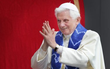 LONDON, ENGLAND - SEPTEMBER 17:  Pope Benedict XVI gestures to school children during The Big Assembly gathering at St Mary's University College during day two of his four day state visit at Twickenham on September 17, 2010 in London, England. Pope Benedict XVI is conducting the first state visit to the UK by a Pontiff. During the four day visit Pope Benedict will celebrate mass, conduct a prayer vigil as well as beatify Cardinal Newman at an open air mass in Cofton Park. His Holiness will meet The Queen as well as political and religious representatives.  (Photo by Peter Macdiarmid - WPA Pool/Getty Images) *** Local Caption *** Pope Benedict XVI