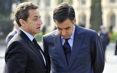 epa02445931 (FILE) A file photo dated 08 may 2010 shows France's President Nicolas Sarkozy (L) speaking with Prime Minister Francois Fillon at the end of a ceremony to mark the end of World War Two in Paris at the Charles de Gaulle statue on the Champs Elysee in Paris, France. Media reported that Fillon has handed in his and his government's resignation to French president Nicolas Sarkozy on 13 November 2010.  EPA/PHILIPPE WOJAZER / POOL MAXPPP OUT