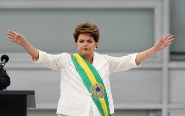 epa02512815 New Brazilian President, Dilma Rousseff, pronounces her first speech after receiving the presidential ribbon by outgoing President Luiz Inácio Lula da Silva (not in picture), at the Planalto Palace in Brasilia, Brazil, on 01 January 2011. Reports state that left-wing economist Dilma Rousseff, 63, inauguration is taking place in Brasilia as the first female president in the history of Brazil. She succeeded her mentor Luiz Inacio Lula da Silva, who left office with record popularity but could not stay on due to constitutional limits on consecutive presidential terms.  EPA/MARCELO SAYAO  EPA/MARCELO SAYAO