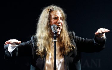 Musician Patti Smith performs at the amfAR Cinema Against AIDS benefit at the Hotel du Cap-Eden-Roc, during the 63rd Cannes international film festival, in Cap d'Antibes, southern France Thursday, May 20, 2010.  (AP Photo/Joel Ryan)