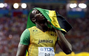 epa01831154 Usain Bolt of Jamaica wins the 200m final with New World  Record at the 12th IAAF World Championships in Athletics, Berlin, Germany, 20 August 2009  EPA/KERIM OKTEN