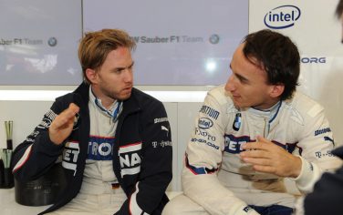 Friday, June 19, 2009 British GP Silverstone England. BMW Sauber F1 Team driver Nick Heidfeld (GER) talking with BMW Sauber F1 Team driver Robert Kubica (POL) This image is copyright free for editorial use © BMW AG. 