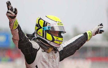 Brawn GP driver Jenson Button of Britain celebrates after winning  the Spanish Formula One Grand Prix at the Circuit de Catalunya racetrack on Sunday, May 10, 2009  in Montmelo, near Barcelona, Spain. (AP Photo/Frank Augstein)