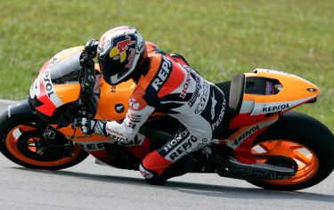 Spain's Dani Pedrosa rides his Honda during a MotoGP test at the International Circuit of Sepang, Malaysia, Friday, Feb. 6, 2009. (AP Photo/Lai Seng Sin)